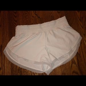 white Lululemon unlined shorts size 4
